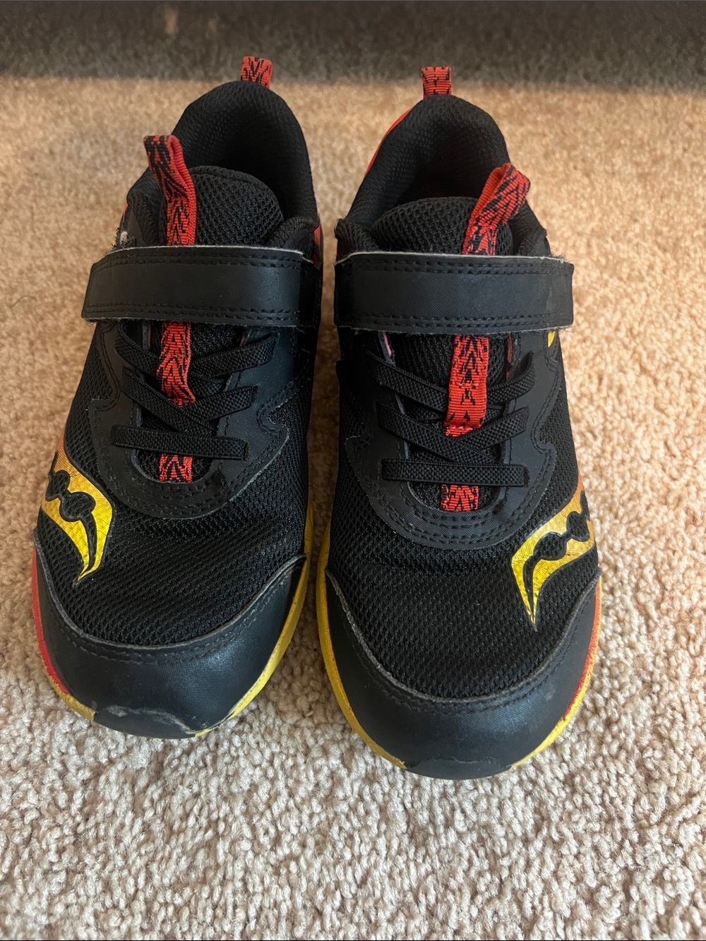 Saucony Kids Black Sneakers with Red and Yellow Accents